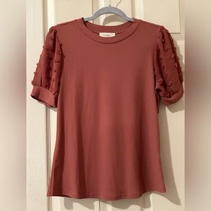 Puff and pompom sleeve top